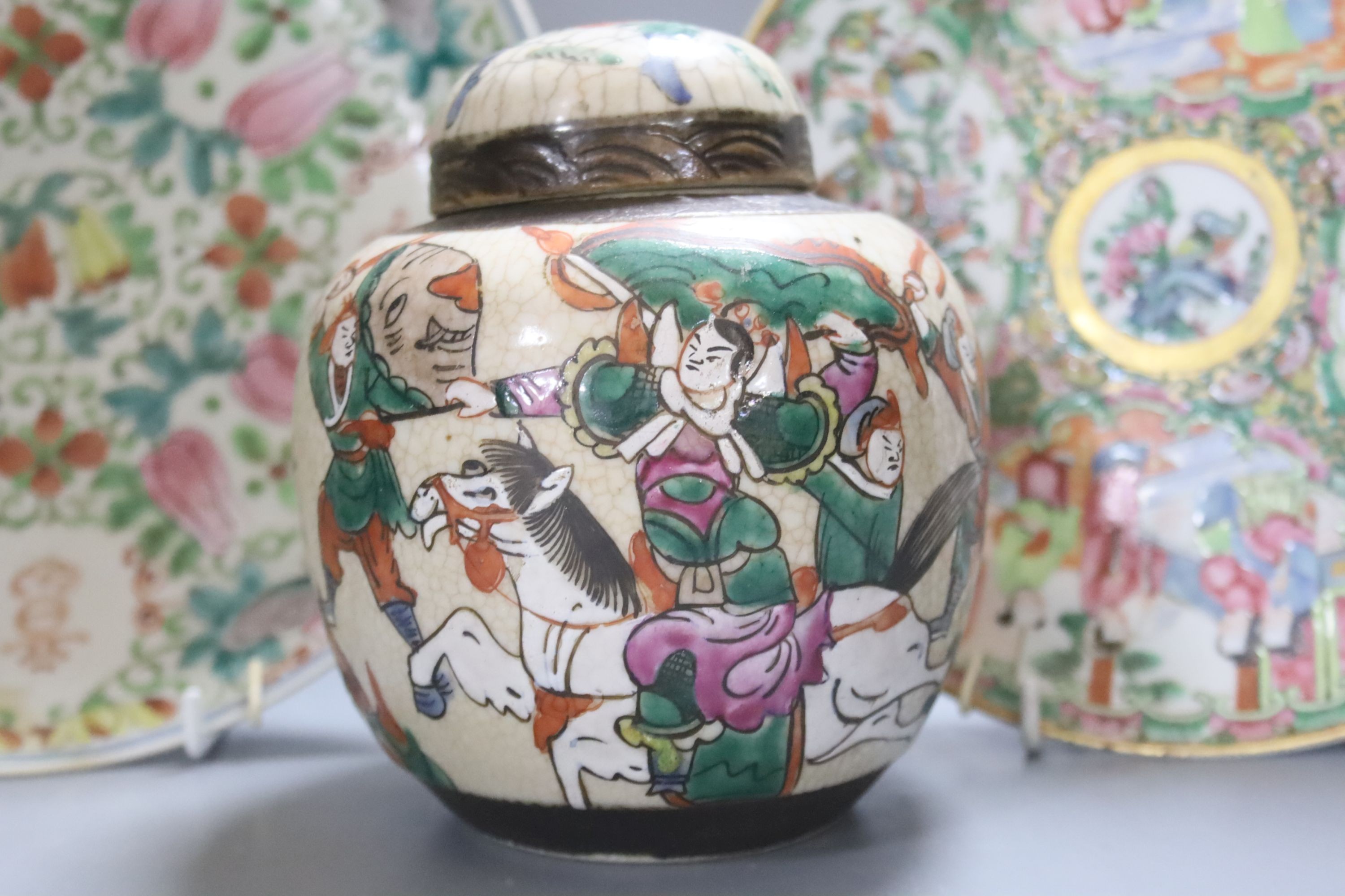 A Chinese famille verte crackle glaze jar and cover, 14.5cm, two famille rose dishes and a crackle glaze ‘dragon’ vase, all late 19th/early 20th century